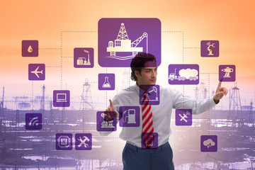 Oil worker in remote operations concept in oil industry