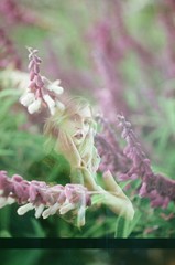 film double exposure of woman with flowers