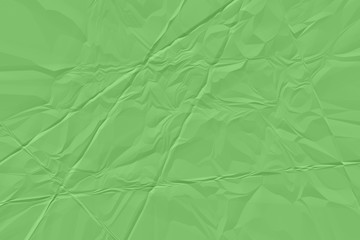 Fototapeta premium crumpled green paper background close up