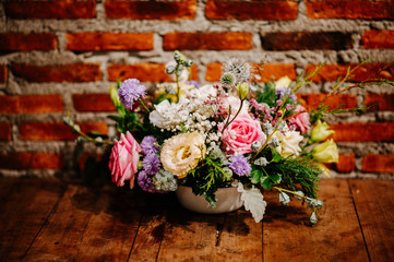 Fototapeta na wymiar Pastel pink, purple, green flower vases that blend perfectly