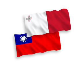 National vector fabric wave flags of Malta and Taiwan isolated on white background. 1 to 2 proportion.