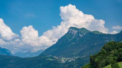 Naklejka na ściany i meble Switzerland, Panoramic view on green Alps and Niederbauen peak