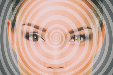 Hypnosis hypnotize spiral over woman face for mind control. - obrazy, fototapety, plakaty