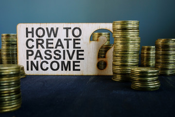 How to create passive income sign and coins. - obrazy, fototapety, plakaty