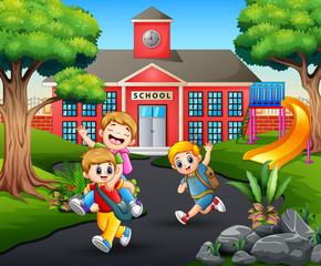 Happy students going home after school