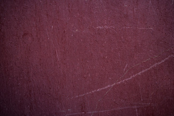 Fototapeta premium Texture of an old wall covered with paint. Background image of a worn paint coated surface