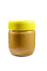 Jar of peanut butter isolated on white background