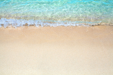 White sand beach, blue sea wave landscape, turquoise transparent ocean water, golden sand close up,...
