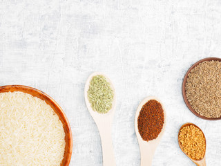 Spices set and rice on white concrete background. Modern apothecary, naturopathy and ayurveda concept.