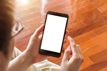 man using mobile phone indoor, close up