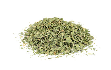 Heap of dried parsley on white background