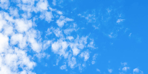 White clouds on the sky background.