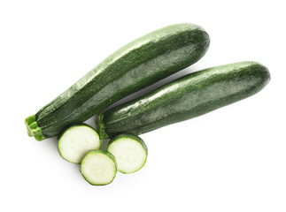 Fresh ripe green zucchinis isolated on white, top view