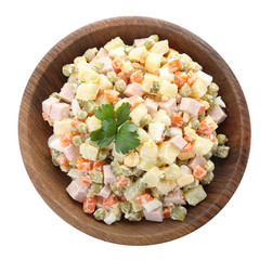 Delicious salad Olivier on white background, top view