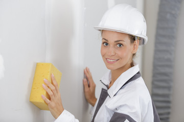 portrait of a woman washes the wall