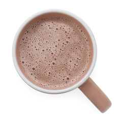 Delicious cocoa in beige cup on white background, top view