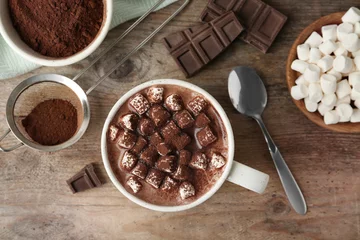 Foto op Plexiglas Composition with delicious hot cocoa drink and marshmallows on wooden background, flat lay © New Africa