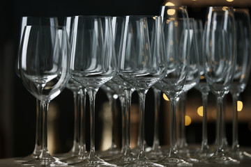 Empty clean glasses on counter in bar