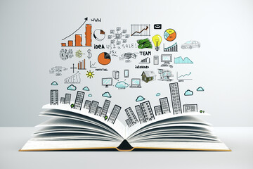 Open book with drawing business plan