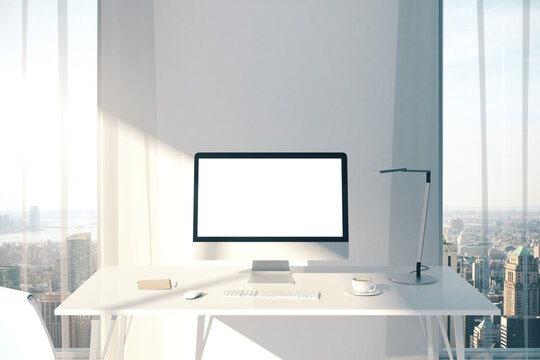 Creative designer desk with empty computer
