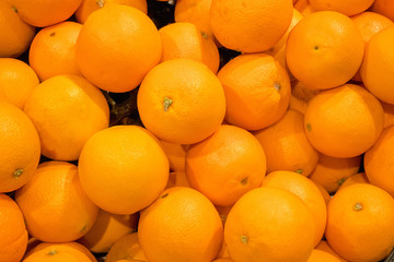 pile of fresh navel orange - close up view