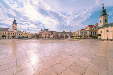 Panorama photo of aeuropean city, the historic center of Oraedea, Romania. Union square (Piata Unirii) with historical buildings.