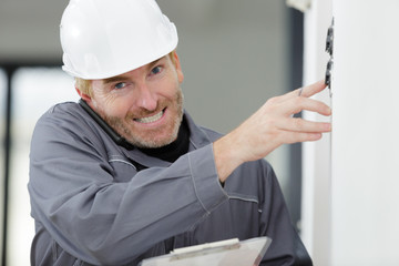 electrician working on electric acces