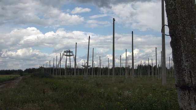 Kharkov, Ukraine - 12th of August 2019: 4K Zoom out deserted ionospheric observatory lost in the countryside