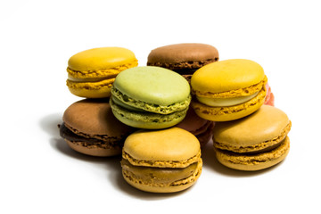 Colored macarons isolated on white background, typical French dish