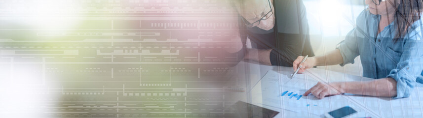 Coworkers having a business discussion, light effect; panoramic banner