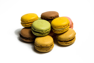 Colored macarons isolated on white background, typical French dish