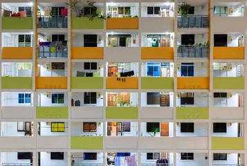 Tuinposter Singapore local residential building HDB facade night view © dongli