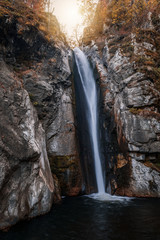 Fototapeta na wymiar Fotinovo waterfalls (Fotinski waterfall) in autumn, Rhodopes Mountain, Bulgaria