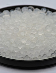 Polypropylene granule close-up background texture.