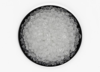 Polypropylene granule close-up background texture.