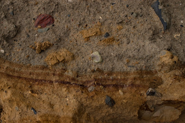 Nature background texture of sedimentary rocks, different sand layer