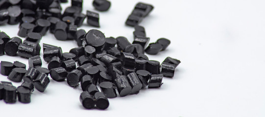 Polypropylene granule close-up background texture.