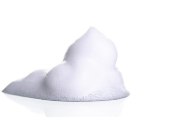 White foam bubbles texture isolated on white