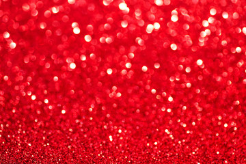 Red glitter texture background, sparkling Christmas wallpaper.