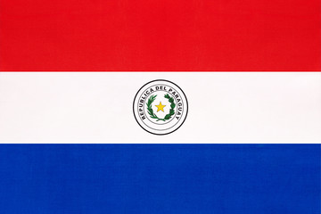 Paraguay national fabric flag, textile background. Paraguayan state official sign.