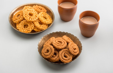 Obraz na płótnie Canvas Diwali Snacks or Diwali sweets, like chakli, sev, bhujiya, shakar pare or favourite indian diwali recipe