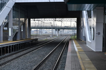 Fototapeta premium at the train station waiting for the train