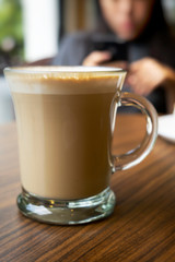 Hot coffee on a wooden table