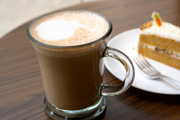 Hot coffee on a wooden table