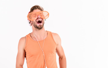 Guy unshaven face listening summer music. Dj boy. Popular summer track list. Technology and...