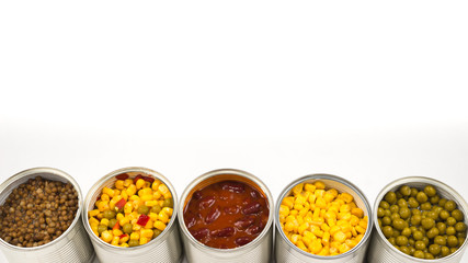 Canned food on white background. Green pea, beans, corn, lentils.