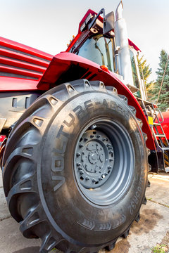 Big wheel of new modern agricultural tractor Kirovets K 4 exhibited at the annual Volga agro-industrial exhibition