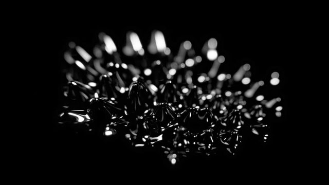 Super Slow Motion Macro Shot of Magnetic Liquid Ferrofluid in Motion at 1000fps.