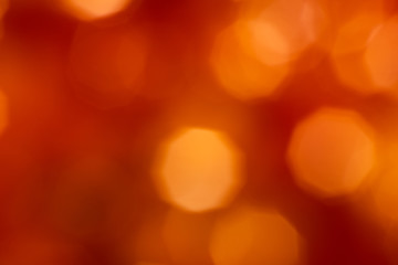Yellow bokeh on a red background