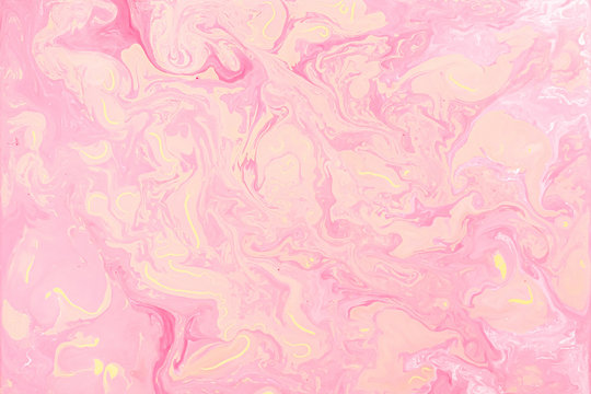 Pink and Yellow Fluid Liquid Acrylic Paint Marbled Texture
